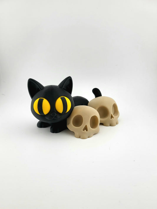 Katze mit Totenköpfen