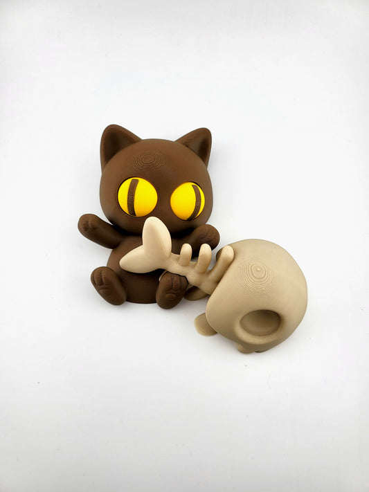 Liegende Katze mit Fischgrete